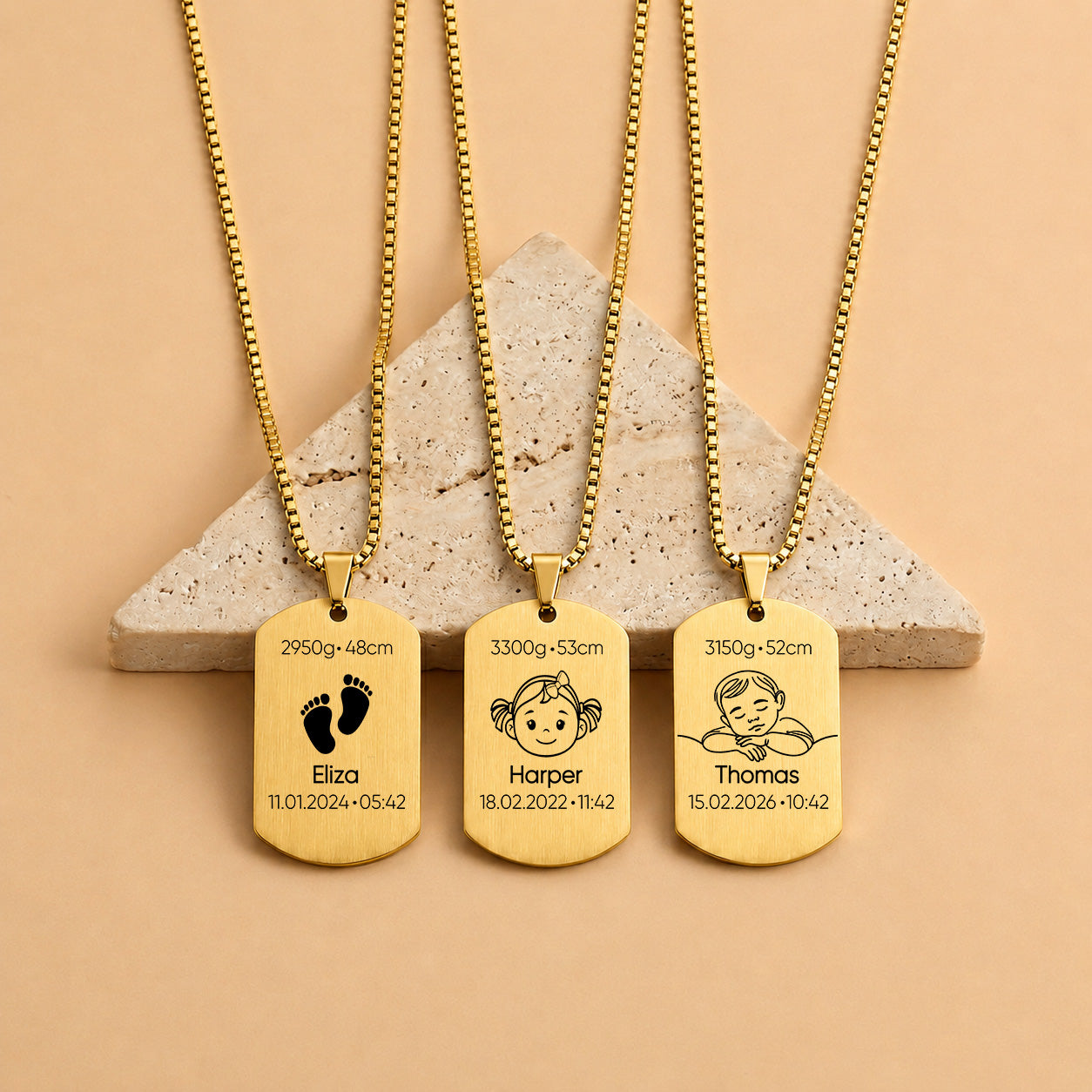 Gold personalised baby keepsake necklace worn on model, engraved with baby name, birth weight, height, date and time.