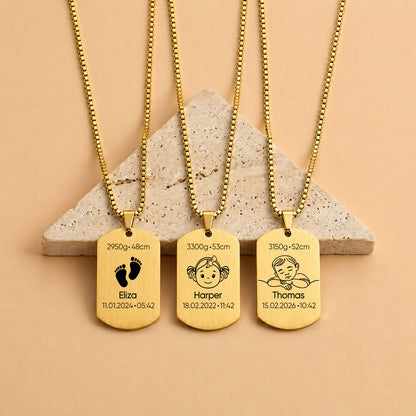 Gold personalised baby keepsake necklace worn on model, engraved with baby name, birth weight, height, date and time.