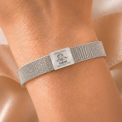 Personalised baby name engraving bracelet in silver and gold with birth details on adjustable mesh strap